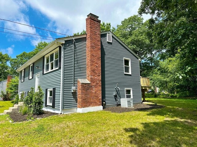 17 Kingsley Rd, Norton, MA 02766 - view of property exterior featuring a chimney and a yard