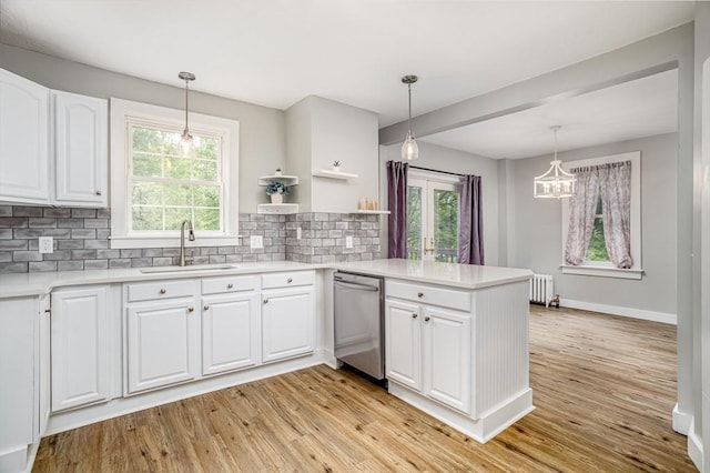 353 Front St, Winchendon, MA 01475 - kitchen featuring dishwasher, a peninsula, tasteful backsplash, and white cabinets