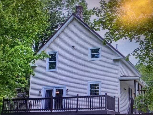 353 Front St, Winchendon, MA 01475 - back of property with a deck and a chimney