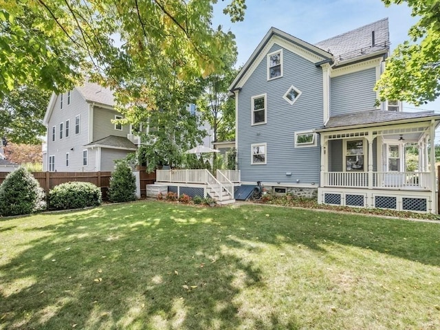 110 Woerd Ave, Waltham, MA 02453 - back of property featuring a deck