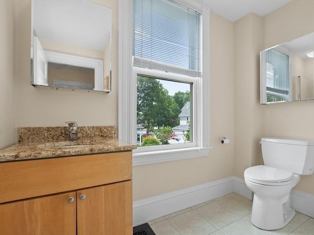 110 Woerd Ave, Waltham, MA 02453 - bathroom with tile patterned flooring and vanity