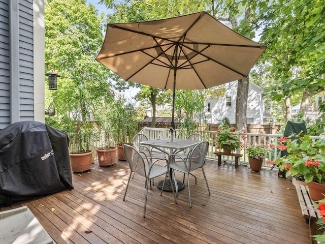 110 Woerd Ave, Waltham, MA 02453 - wooden terrace with area for grilling and outdoor dining space