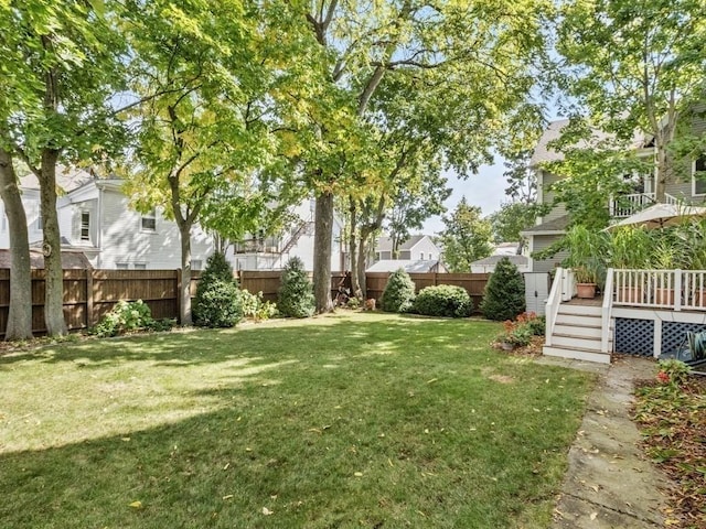 110 Woerd Ave, Waltham, MA 02453 - fenced backyard featuring a deck and a residential view