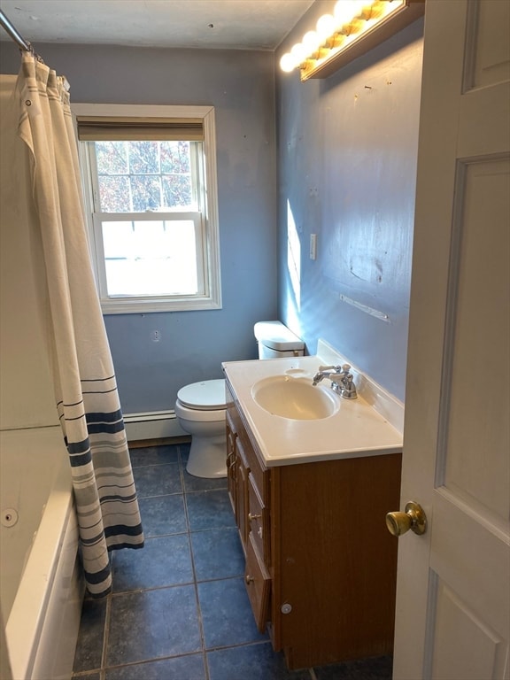 full bathroom featuring tile patterned flooring, a baseboard heating unit, shower / bath combination with curtain, toilet, and vanity