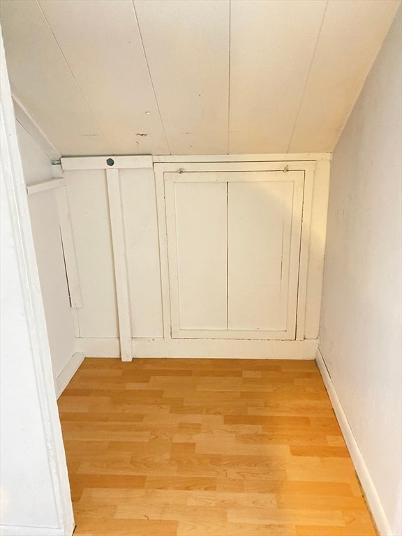 additional living space with light wood-type flooring