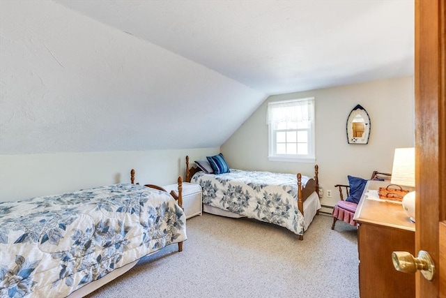 carpeted bedroom featuring vaulted ceiling