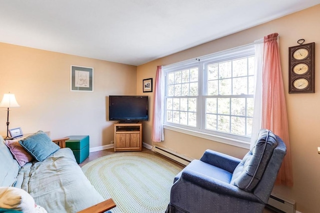 carpeted living room with baseboard heating