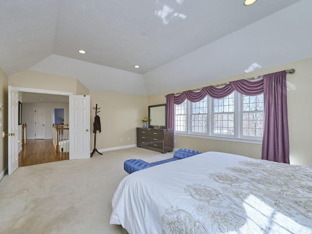 bedroom featuring recessed lighting, baseboards, lofted ceiling, and carpet floors