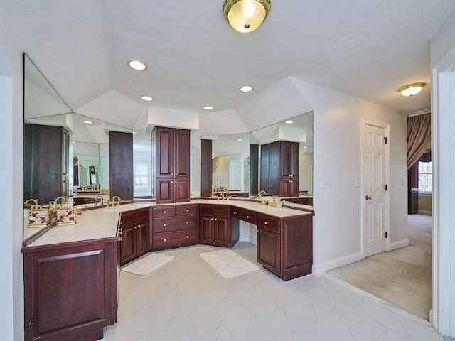 full bath featuring recessed lighting, vanity, marble finish floor, and baseboards