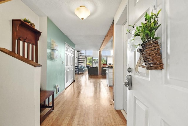 hallway with light wood-style flooring