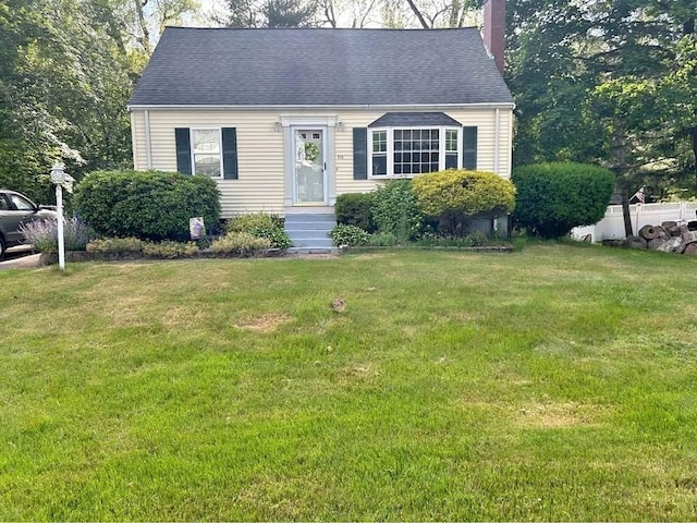 view of front of house with a front lawn