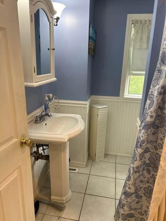 bathroom featuring tile patterned flooring