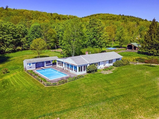 85 Warfield Rd, Charlemont, MA 01339 - back of property featuring a wooded view, an outdoor pool, and a lawn