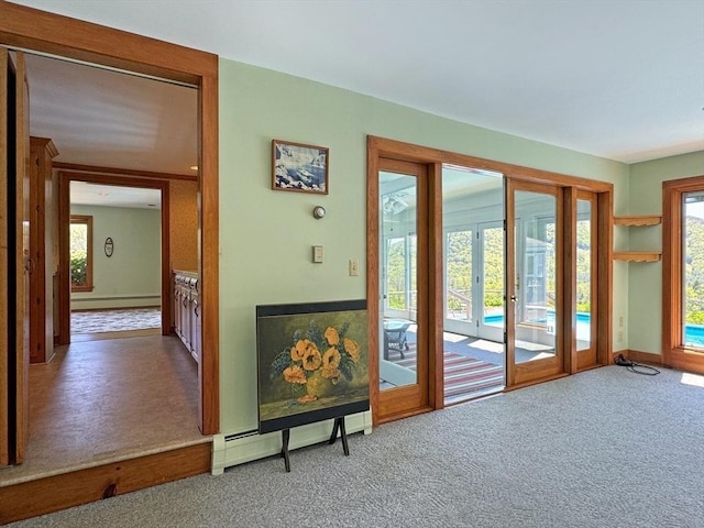 85 Warfield Rd, Charlemont, MA 01339 - entryway with baseboard heating and carpet flooring