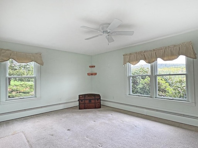 85 Warfield Rd, Charlemont, MA 01339 - carpeted empty room with a baseboard heating unit, plenty of natural light, and a ceiling fan