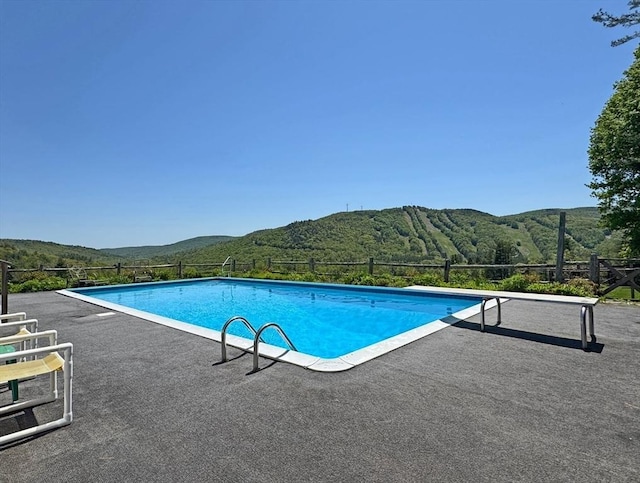 85 Warfield Rd, Charlemont, MA 01339 - view of pool featuring a mountain view, fence, and a patio