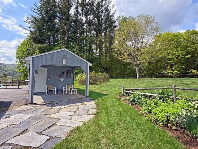 85 Warfield Rd, Charlemont, MA 01339 - view of yard featuring an outdoor structure and a patio area