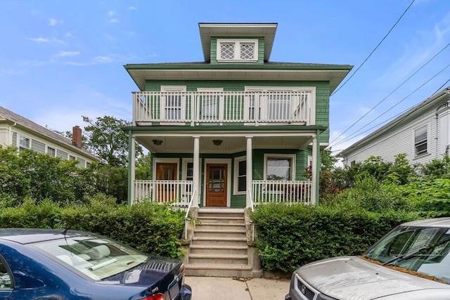 57 Atherton St Unit 57, Somerville, MA 02143 - american foursquare style home featuring a balcony and covered porch