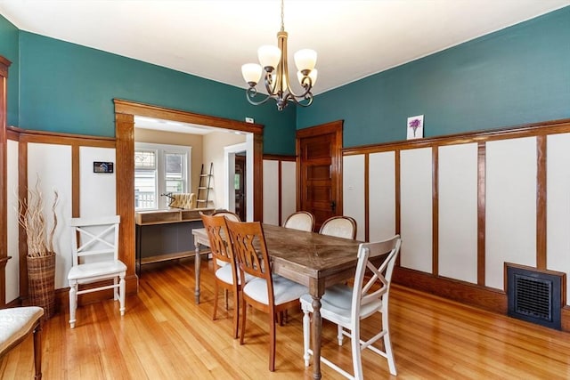 57 Atherton St Unit 57, Somerville, MA 02143 - dining room featuring light wood-style floors and a chandelier