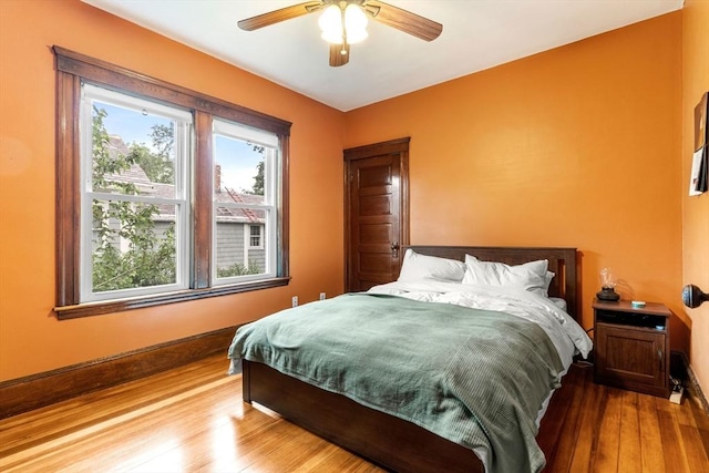 57 Atherton St Unit 57, Somerville, MA 02143 - bedroom featuring multiple windows, wood finished floors, and ceiling fan
