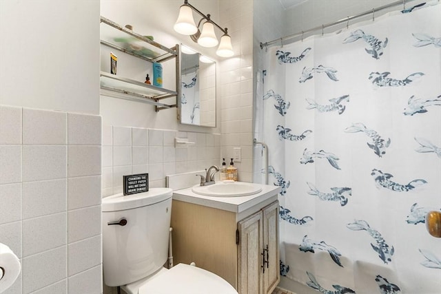 57 Atherton St Unit 57, Somerville, MA 02143 - full bathroom featuring tile walls, vanity, and curtained shower