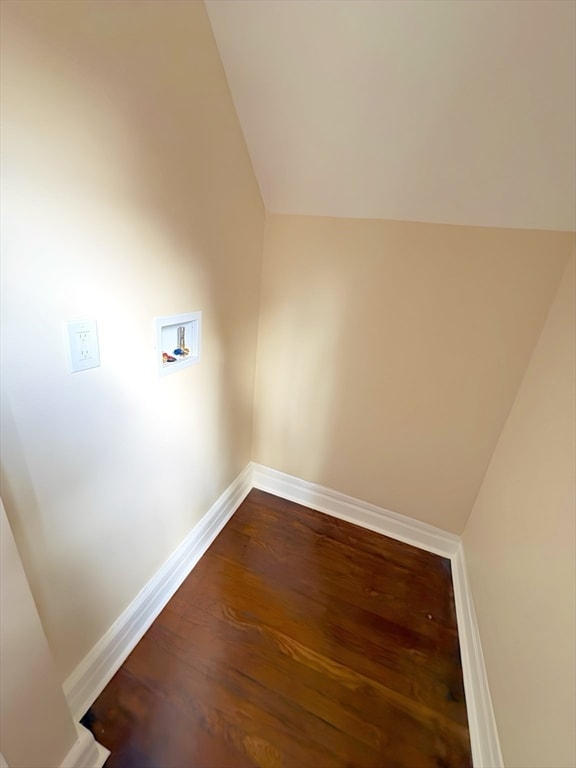 washroom featuring hardwood / wood-style flooring and hookup for a washing machine