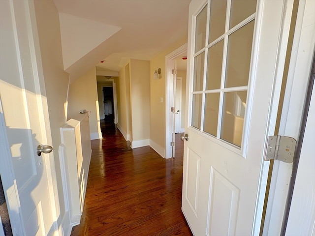 hall with dark hardwood / wood-style floors