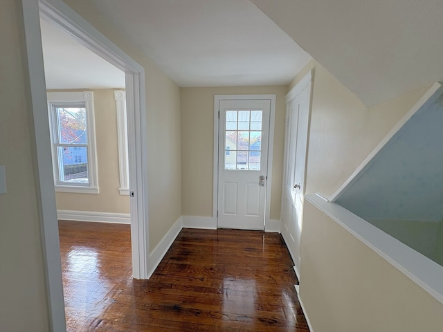 doorway to outside featuring dark hardwood / wood-style floors and plenty of natural light