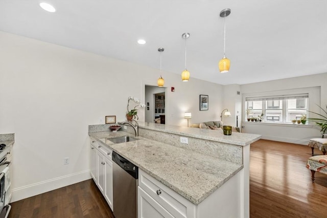 116 Rantoul St Unit 503, Beverly, MA 01915 - kitchen featuring stainless steel dishwasher, a peninsula, open floor plan, dark wood-type flooring, and white cabinetry