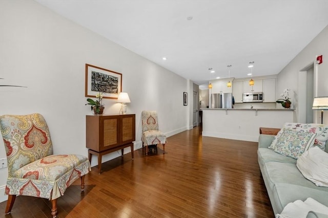 116 Rantoul St Unit 503, Beverly, MA 01915 - living area with wood finished floors and recessed lighting