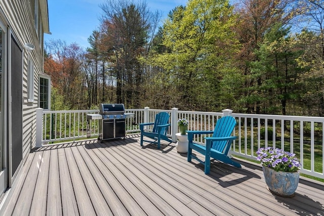 wooden deck with area for grilling