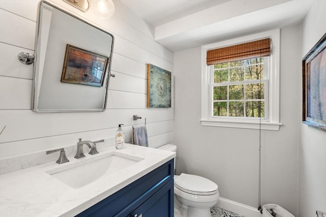half bath with toilet and vanity