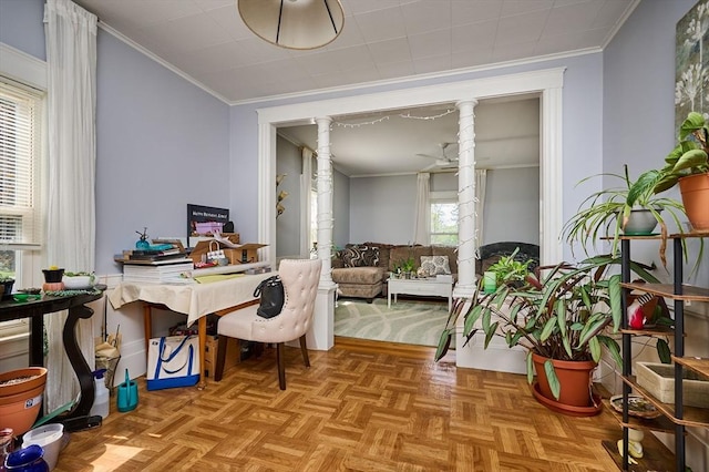 home office featuring ornate columns and crown molding