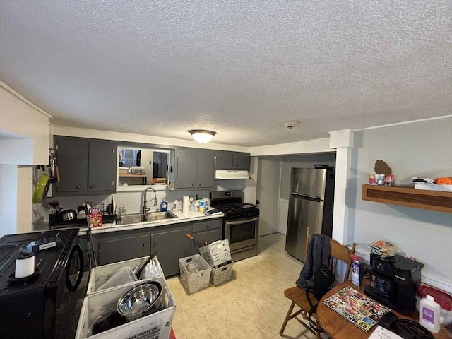 44 Cherry St Unit 2, Swampscott, MA 01907 - kitchen featuring stainless steel appliances, a sink, under cabinet range hood, open shelves, and a textured ceiling