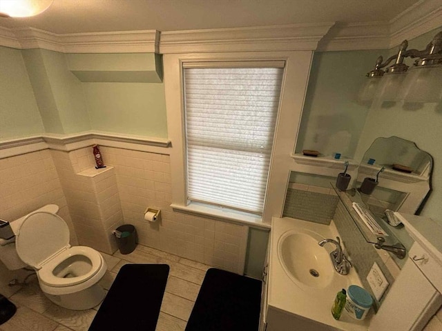 44 Cherry St Unit 2, Swampscott, MA 01907 - bathroom featuring crown molding, toilet, tile walls, tile patterned flooring, and vanity