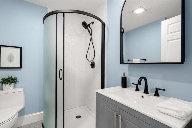 43 Ainsworth St Unit 2, Boston, MA 02131 - full bathroom featuring vanity, toilet, baseboards, and a stall shower