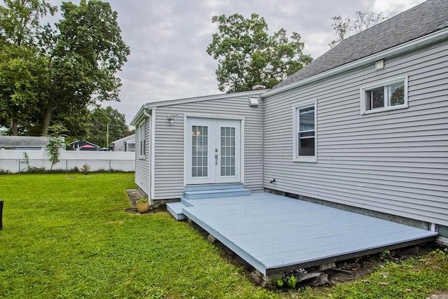 back of property featuring french doors and a wooden deck