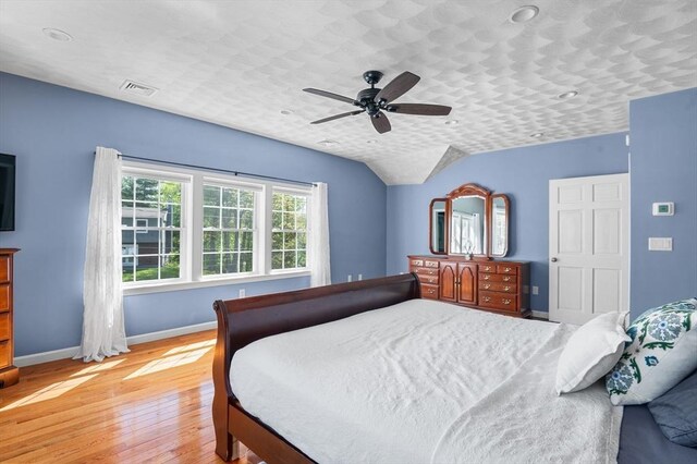 21 Molloy Rd, Georgetown, MA 01833 - bedroom with light wood-style floors, baseboards, a ceiling fan, and vaulted ceiling