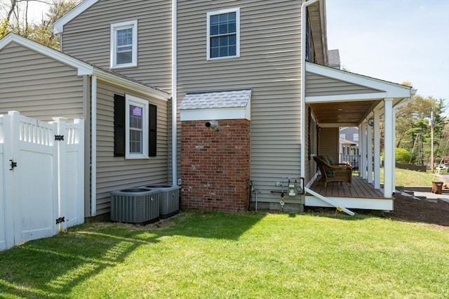 21 Molloy Rd, Georgetown, MA 01833 - rear view of property featuring a yard and central AC