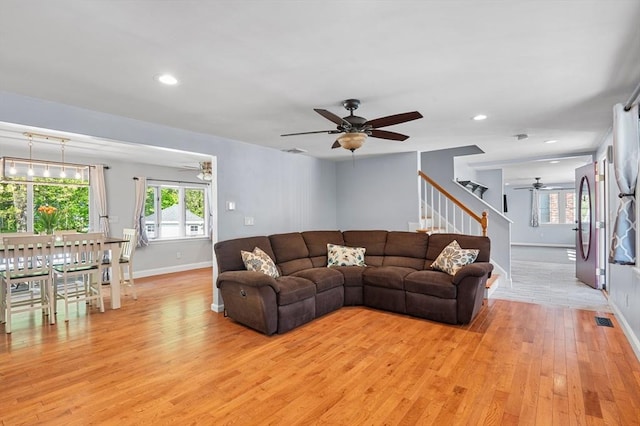 21 Molloy Rd, Georgetown, MA 01833 - living area featuring ceiling fan, light wood finished floors, baseboards, stairway, and recessed lighting