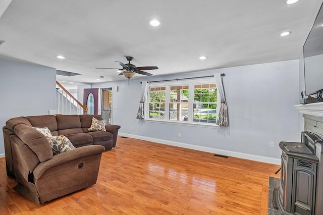 21 Molloy Rd, Georgetown, MA 01833 - living room with stairway, light wood-style flooring, baseboards, recessed lighting, and a ceiling fan
