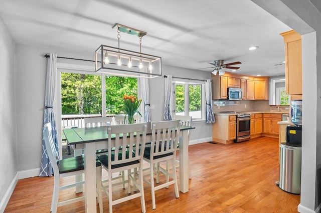 21 Molloy Rd, Georgetown, MA 01833 - dining space featuring baseboards, light wood-style floors, ceiling fan, and recessed lighting