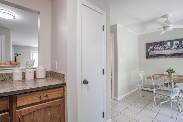 40 Sharron Dr Unit 40, Easton, MA 02375 - dining space with light tile patterned flooring, a ceiling fan, and crown molding