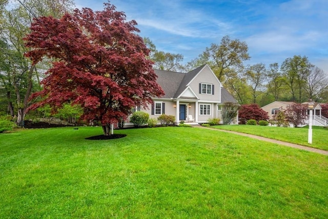view of front facade with a front yard