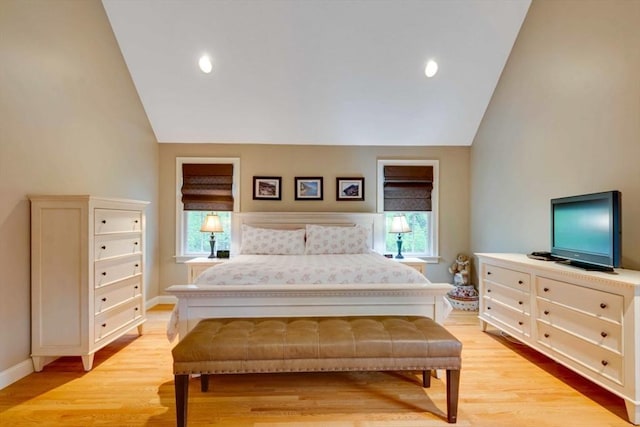 bedroom featuring vaulted ceiling, multiple windows, light wood-type flooring, baseboards, and recessed lighting