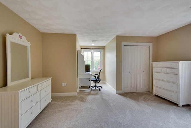 office featuring light carpet and baseboards
