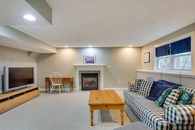living area with baseboards, carpet floors, a fireplace, and recessed lighting