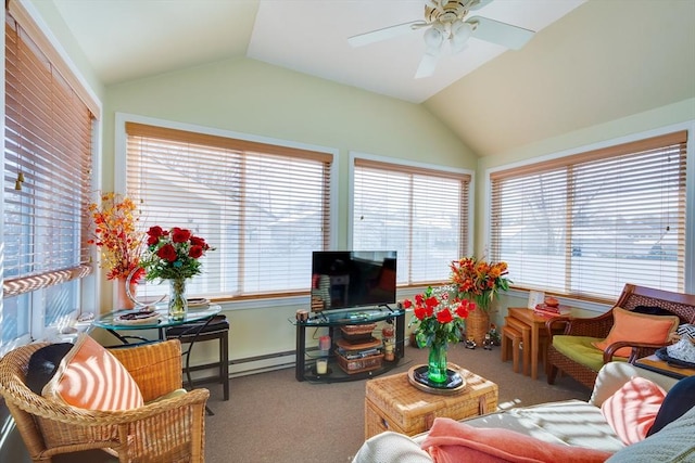 sunroom featuring lofted ceiling and ceiling fan