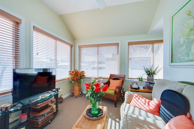 sunroom / solarium featuring vaulted ceiling and plenty of natural light