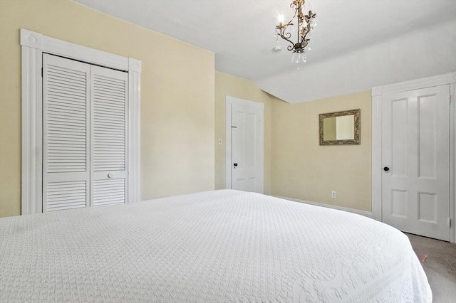 30 Wentworth Ave, Lowell, MA 01852 - carpeted bedroom with a closet, a chandelier, and lofted ceiling